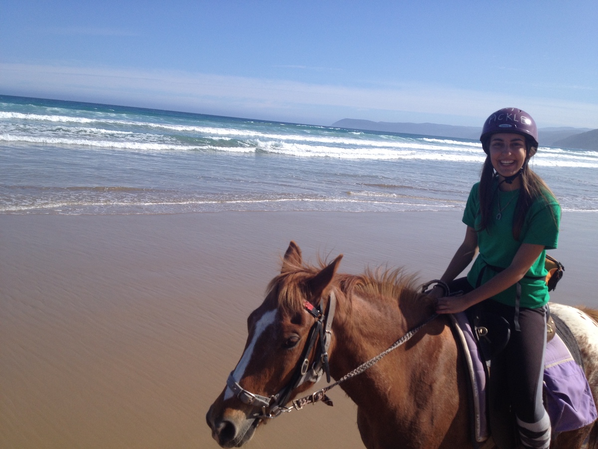 cantering on the beach